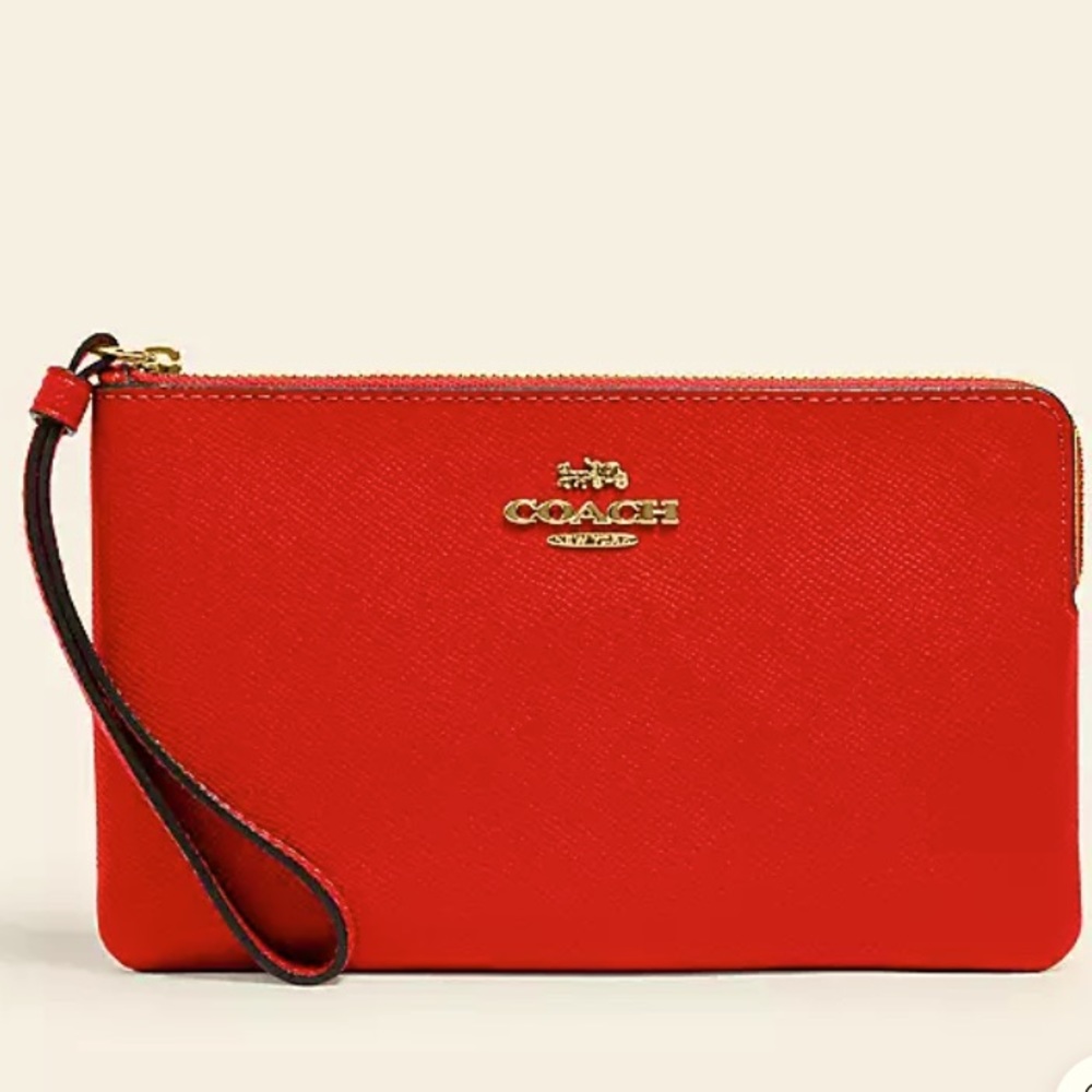 Coach red zipper wristlet-never been used.